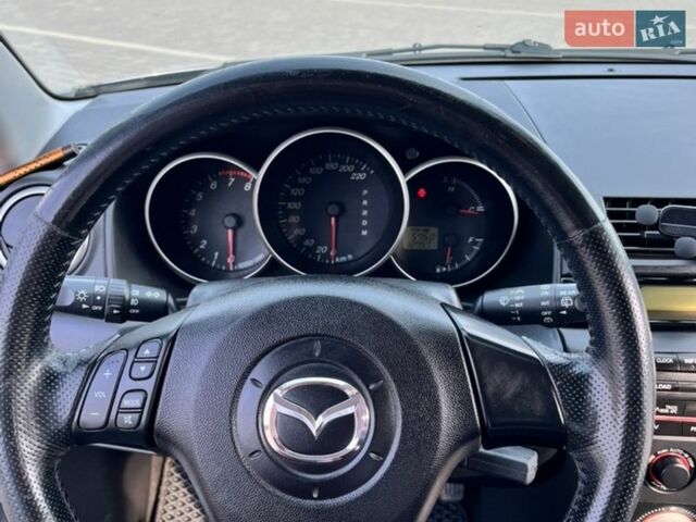 Серый Мазда 3, объемом двигателя 1.6 л и пробегом 127 тыс. км за 6300 $, фото 13 на Automoto.ua