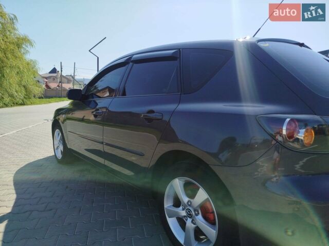 Серый Мазда 3, объемом двигателя 1.6 л и пробегом 297 тыс. км за 4000 $, фото 18 на Automoto.ua