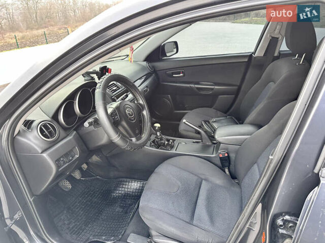 Сірий Мазда 3, об'ємом двигуна 1.6 л та пробігом 300 тис. км за 4500 $, фото 24 на Automoto.ua