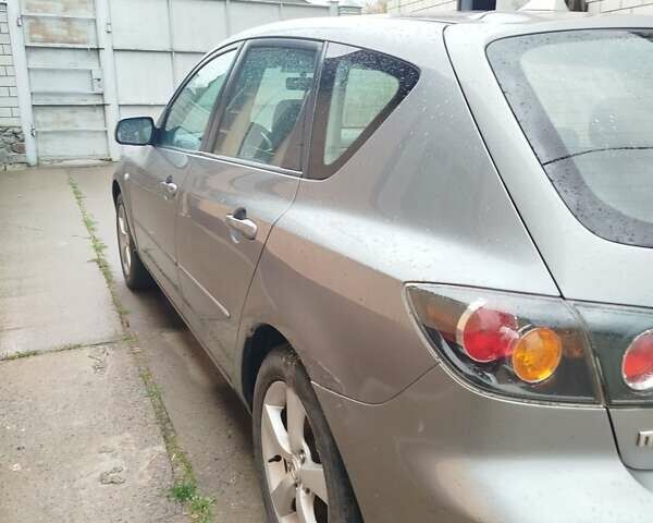 Мазда 3 2005 в Мерефа на Automoto.ua Серый Мазда 3, объемом двигателя 1.6 л и пробегом 198 тыс. км за 3900 $, фото 3 на Automoto.ua