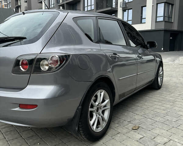 Сірий Мазда 3, об'ємом двигуна 1.56 л та пробігом 319 тис. км за 3700 $, фото 4 на Automoto.ua
