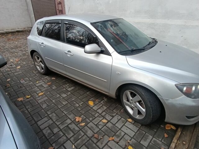 Серый Мазда 3, объемом двигателя 1.3 л и пробегом 196 тыс. км за 2700 $, фото 3 на Automoto.ua