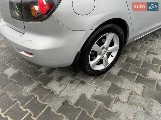 Сірий Мазда 3, об'ємом двигуна 1.6 л та пробігом 187 тис. км за 4200 $, фото 9 на Automoto.ua