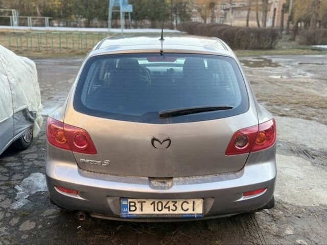 Сірий Мазда 3, об'ємом двигуна 1.6 л та пробігом 245 тис. км за 2300 $, фото 4 на Automoto.ua