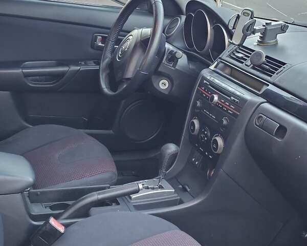 Серый Мазда 3, объемом двигателя 1.6 л и пробегом 235 тыс. км за 4999 $, фото 15 на Automoto.ua