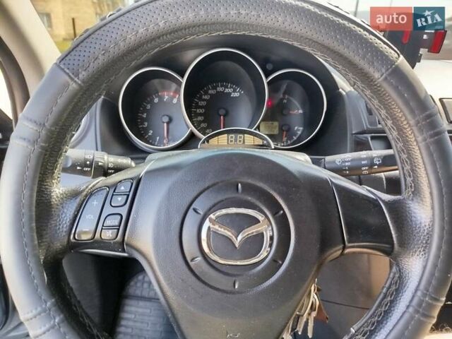 Сірий Мазда 3, об'ємом двигуна 1.6 л та пробігом 297 тис. км за 5550 $, фото 8 на Automoto.ua