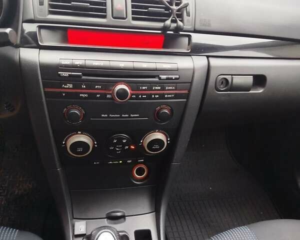 Мазда 3 2005 в Мерефа на Automoto.ua Серый Мазда 3, объемом двигателя 1.6 л и пробегом 198 тыс. км за 3900 $, фото 12 на Automoto.ua