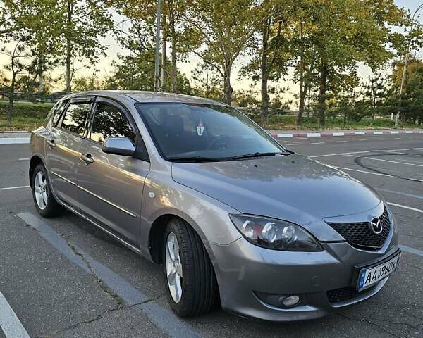 Серый Мазда 3, объемом двигателя 1.6 л и пробегом 235 тыс. км за 4999 $, фото 8 на Automoto.ua