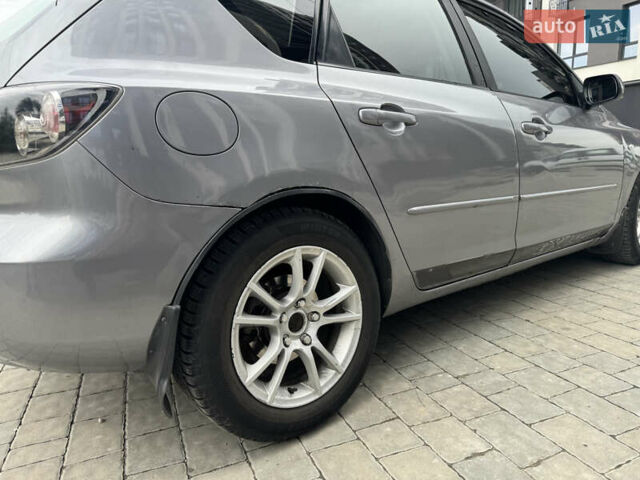 Сірий Мазда 3, об'ємом двигуна 1.56 л та пробігом 319 тис. км за 3700 $, фото 19 на Automoto.ua