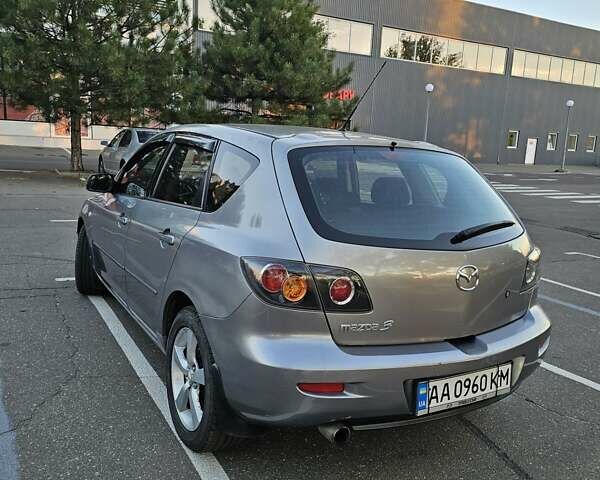 Серый Мазда 3, объемом двигателя 1.6 л и пробегом 235 тыс. км за 4999 $, фото 9 на Automoto.ua