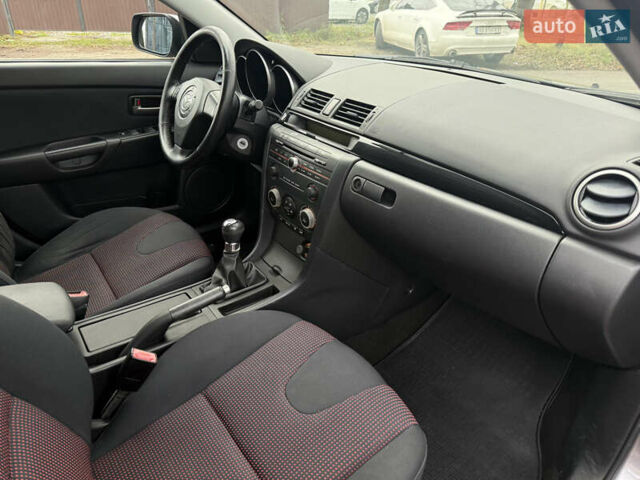 Серый Мазда 3, объемом двигателя 1.6 л и пробегом 207 тыс. км за 4600 $, фото 25 на Automoto.ua