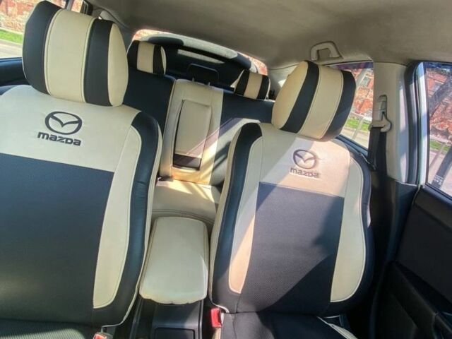 Сірий Мазда 3, об'ємом двигуна 1.6 л та пробігом 275 тис. км за 4300 $, фото 2 на Automoto.ua