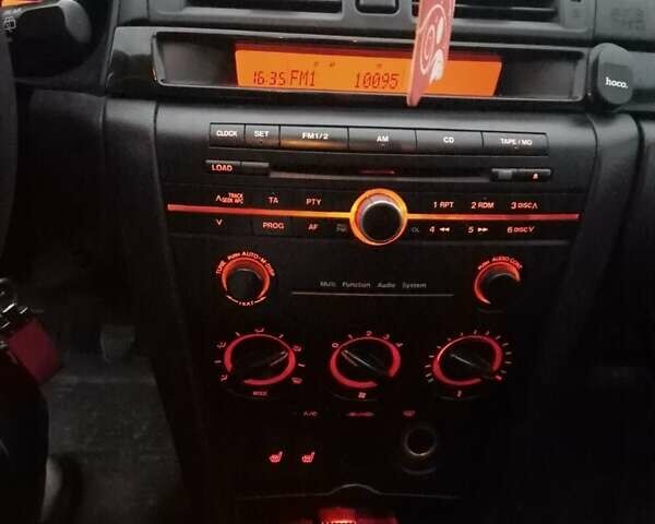 Серый Мазда 3, объемом двигателя 1.6 л и пробегом 206 тыс. км за 3950 $, фото 10 на Automoto.ua