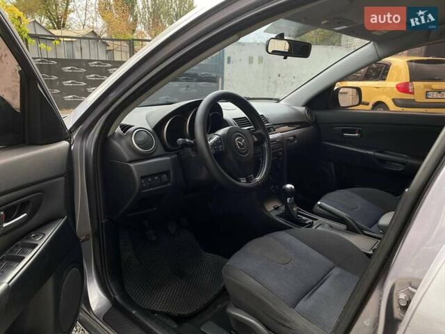 Серый Мазда 3, объемом двигателя 1.6 л и пробегом 200 тыс. км за 4850 $, фото 10 на Automoto.ua