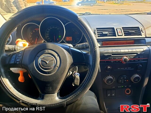 Серый Мазда 3, объемом двигателя 1.6 л и пробегом 296 тыс. км за 4000 $, фото 7 на Automoto.ua
