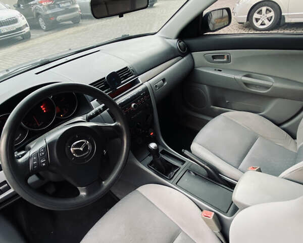 Серый Мазда 3, объемом двигателя 1.35 л и пробегом 304 тыс. км за 3500 $, фото 13 на Automoto.ua