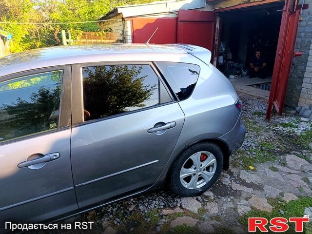 Серый Мазда 3, объемом двигателя 1.6 л и пробегом 248 тыс. км за 5000 $, фото 8 на Automoto.ua