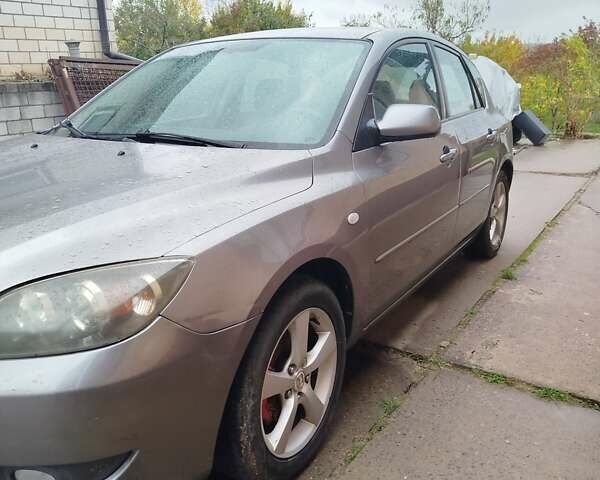 Мазда 3 2005 в Мерефа на Automoto.ua Серый Мазда 3, объемом двигателя 1.6 л и пробегом 198 тыс. км за 3900 $, фото 5 на Automoto.ua