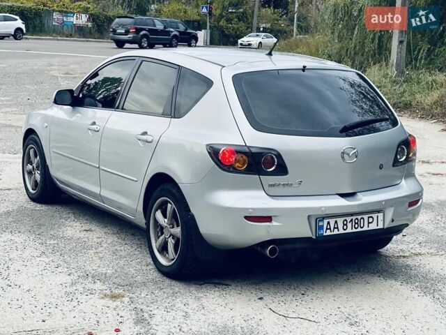 Сірий Мазда 3, об'ємом двигуна 1.6 л та пробігом 199 тис. км за 4600 $, фото 7 на Automoto.ua