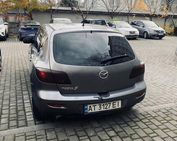 Серый Мазда 3, объемом двигателя 1.35 л и пробегом 304 тыс. км за 3500 $, фото 10 на Automoto.ua