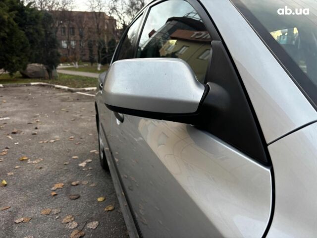 Сірий Мазда 3, об'ємом двигуна 1.4 л та пробігом 198 тис. км за 5490 $, фото 9 на Automoto.ua