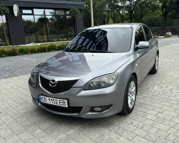 Сірий Мазда 3, об'ємом двигуна 1.56 л та пробігом 319 тис. км за 3700 $, фото 1 на Automoto.ua