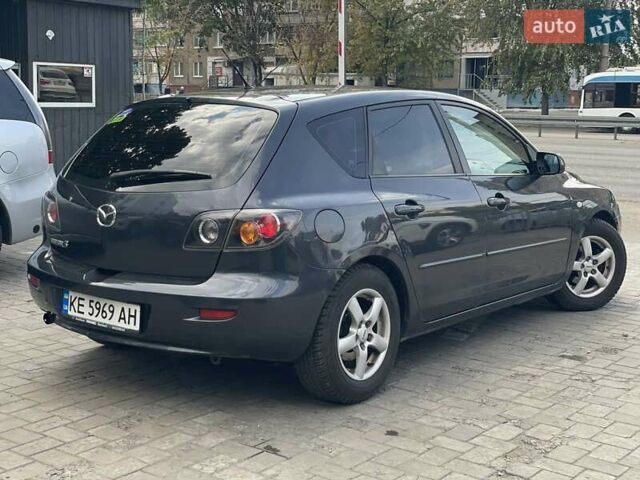 Сірий Мазда 3, об'ємом двигуна 1.6 л та пробігом 258 тис. км за 4600 $, фото 3 на Automoto.ua