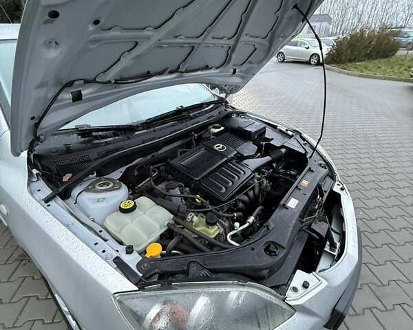 Сірий Мазда 3, об'ємом двигуна 1.6 л та пробігом 176 тис. км за 4800 $, фото 16 на Automoto.ua