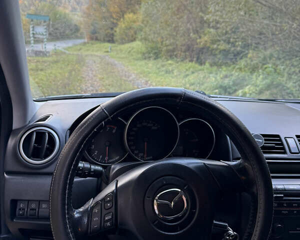 Серый Мазда 3, объемом двигателя 1.6 л и пробегом 248 тыс. км за 4800 $, фото 39 на Automoto.ua