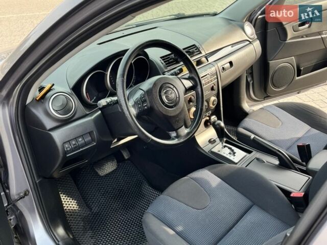Серый Мазда 3, объемом двигателя 1.6 л и пробегом 127 тыс. км за 6300 $, фото 12 на Automoto.ua