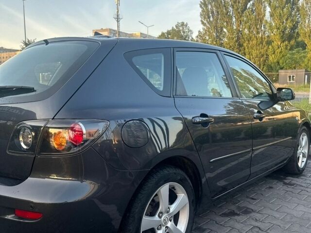 Сірий Мазда 3, об'ємом двигуна 1.6 л та пробігом 254 тис. км за 4999 $, фото 13 на Automoto.ua