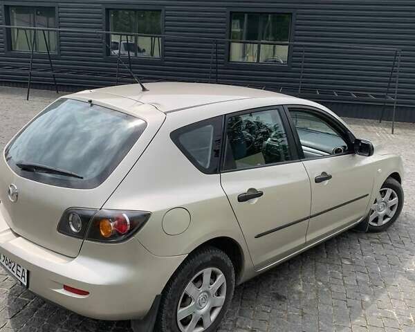 Серый Мазда 3, объемом двигателя 1.3 л и пробегом 240 тыс. км за 4100 $, фото 3 на Automoto.ua