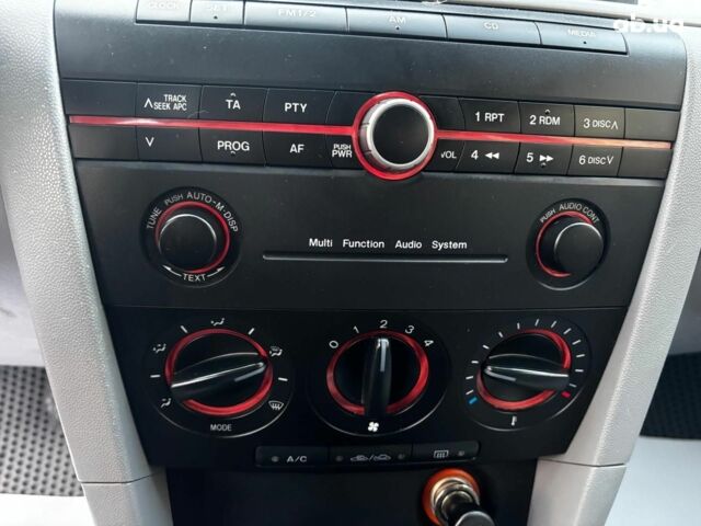 Сірий Мазда 3, об'ємом двигуна 1.4 л та пробігом 198 тис. км за 5490 $, фото 21 на Automoto.ua