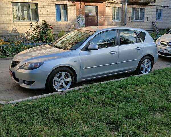 Сірий Мазда 3, об'ємом двигуна 1.6 л та пробігом 181 тис. км за 4650 $, фото 9 на Automoto.ua