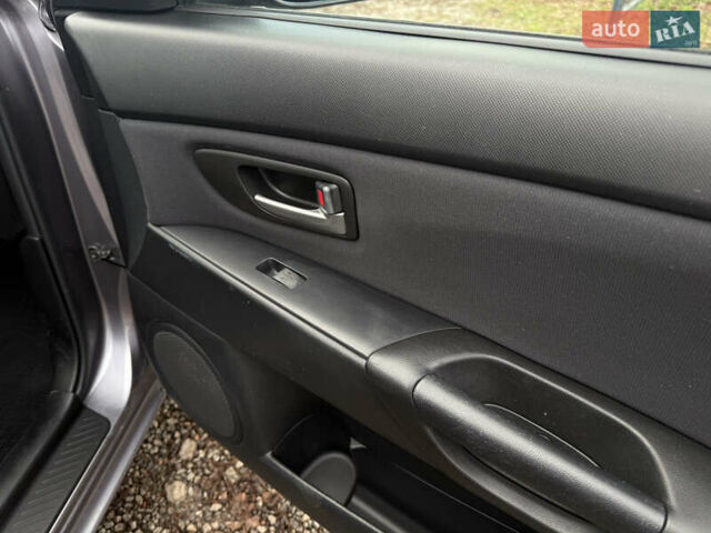 Серый Мазда 3, объемом двигателя 1.6 л и пробегом 207 тыс. км за 4600 $, фото 28 на Automoto.ua