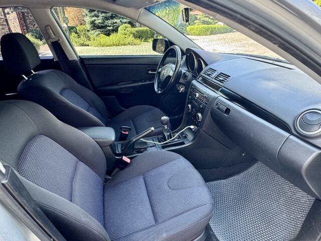 Сірий Мазда 3, об'ємом двигуна 1.6 л та пробігом 168 тис. км за 4854 $, фото 7 на Automoto.ua