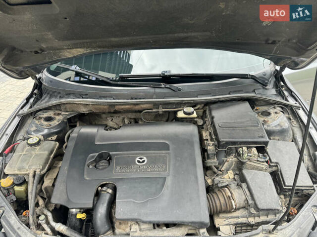 Сірий Мазда 3, об'ємом двигуна 1.56 л та пробігом 319 тис. км за 3700 $, фото 25 на Automoto.ua