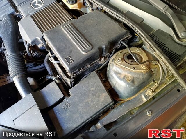 Серый Мазда 3, объемом двигателя 1.6 л и пробегом 248 тыс. км за 5000 $, фото 9 на Automoto.ua