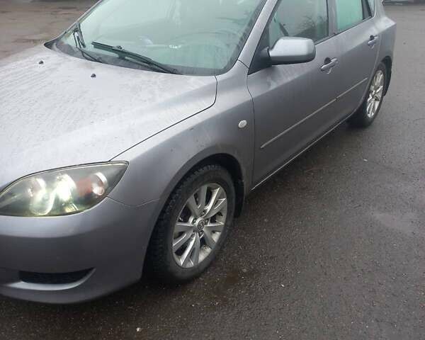 Серый Мазда 3, объемом двигателя 1.6 л и пробегом 286 тыс. км за 5500 $, фото 2 на Automoto.ua