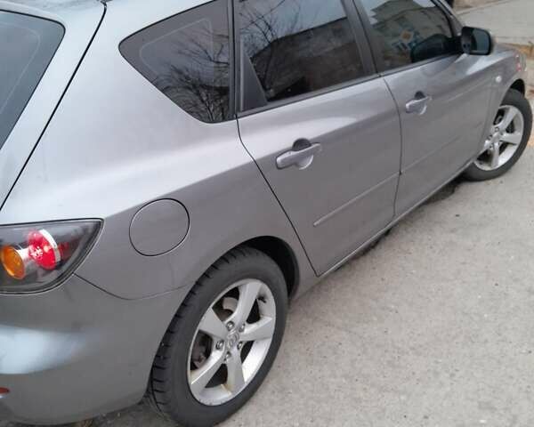 Серый Мазда 3, объемом двигателя 1.6 л и пробегом 180 тыс. км за 4650 $, фото 6 на Automoto.ua