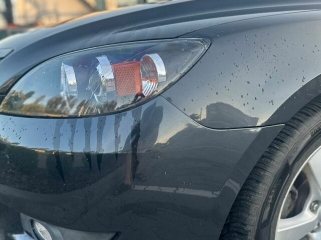 Сірий Мазда 3, об'ємом двигуна 1.6 л та пробігом 254 тис. км за 4999 $, фото 3 на Automoto.ua