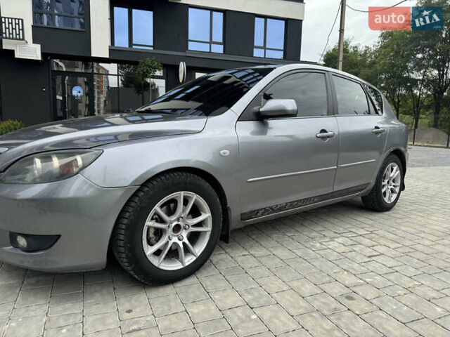 Сірий Мазда 3, об'ємом двигуна 1.56 л та пробігом 319 тис. км за 3700 $, фото 10 на Automoto.ua