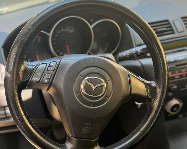 Сірий Мазда 3, об'ємом двигуна 1.6 л та пробігом 181 тис. км за 4650 $, фото 22 на Automoto.ua