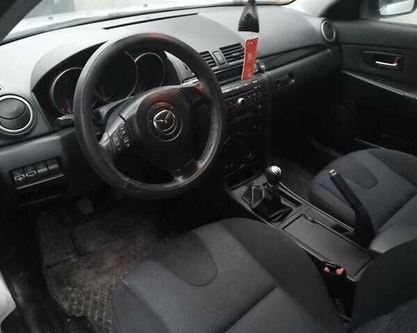 Серый Мазда 3, объемом двигателя 1.6 л и пробегом 206 тыс. км за 3950 $, фото 6 на Automoto.ua