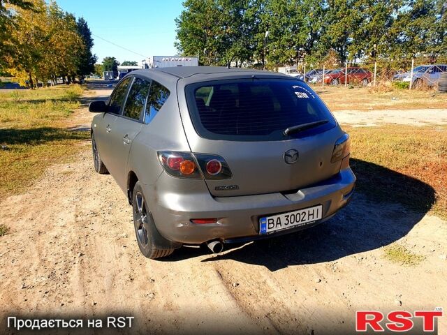 Серый Мазда 3, объемом двигателя 1.6 л и пробегом 296 тыс. км за 4000 $, фото 6 на Automoto.ua
