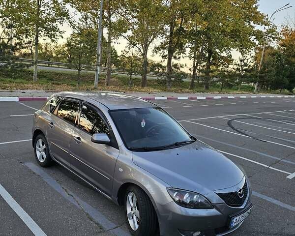 Серый Мазда 3, объемом двигателя 1.6 л и пробегом 235 тыс. км за 4999 $, фото 7 на Automoto.ua