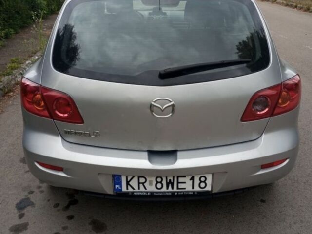 Серый Мазда 3, объемом двигателя 1.6 л и пробегом 239 тыс. км за 1872 $, фото 2 на Automoto.ua
