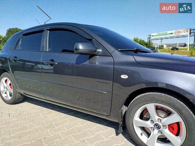 Сірий Мазда 3, об'ємом двигуна 1.6 л та пробігом 297 тис. км за 5550 $, фото 16 на Automoto.ua