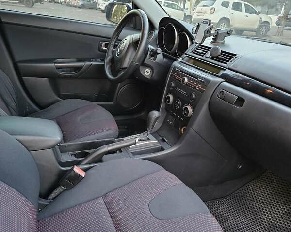 Серый Мазда 3, объемом двигателя 1.6 л и пробегом 235 тыс. км за 4999 $, фото 13 на Automoto.ua