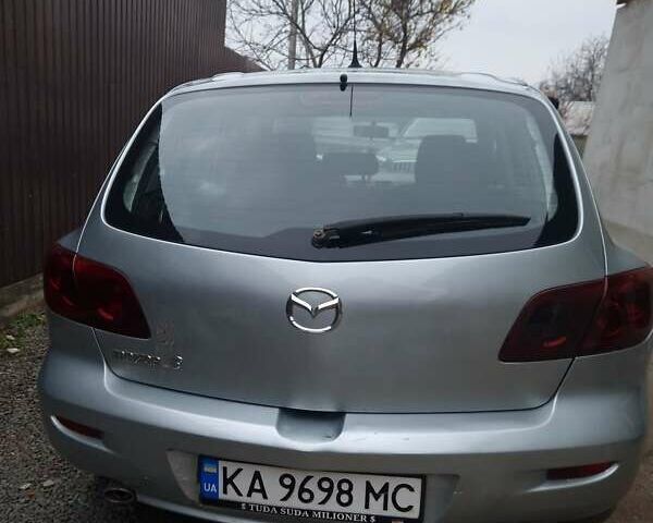 Серый Мазда 3, объемом двигателя 1.6 л и пробегом 206 тыс. км за 3950 $, фото 1 на Automoto.ua
